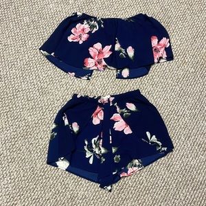 I have a super cute 2 piece set it’s blue,pink white green!!